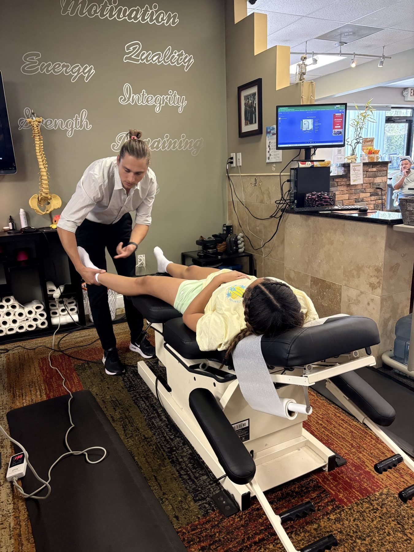 Hands-on chiropractic treatment at Back in Action